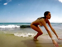 Young brunette teen with nice perky tits outdoors on the beach & swimming in the ocean