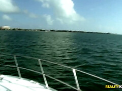 Courtney Cummz showing her sexy curves on the yacht