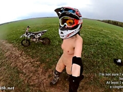 Naked woman riding a Dirt Bike