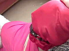 stiffly bound, ball-gagged and masked footballer in pink kit abused by femdom