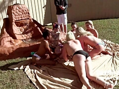 Horny babes licking and fucking toys in outdoor lesbian orgy