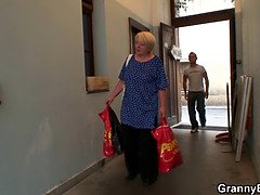 Busty blonde grandma spreads legs for a stranger