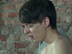 Lyle strokes his uncut cock after butt spanking and whipping