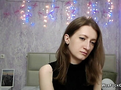 Brunette babe strips to bra on webcam solo show
