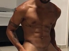 Hot black guy jerking off his load of cum on camera