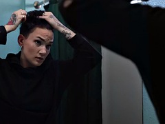 A dykes hairy pussy was licked by a tattooed homosexual in the bathroom