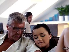 Naughty stepdad fucks stunning brunette on sofa with expert skills