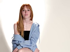 Ginger babe teasing herself gently
