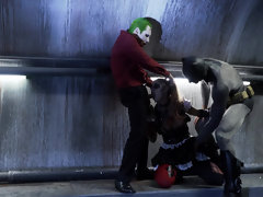 Superhero Kleio Valentien sandwiched between Joker and Batman