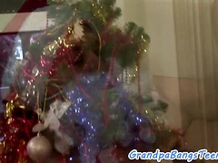 Lucky grandpa Santa enjoys getting his teen pussy pounded by a horny young amateur