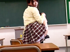 Japanese schoolgirl flashes her cute panties in the classroom