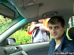 Blond granny has threesome outdoors