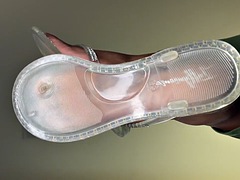 Ebony feet play with flip flops