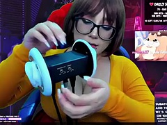 Velma Peke sucks your ear and makes you want cream on her tits.