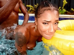 Sarai Minx gets oiled up in the pool for Jonathan Jordan