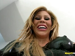 Brooklyn Lee wearing fantastic latex outfit rubbing her clit