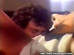 Classic babe fucks two guys