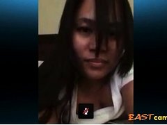 Asian Filipino Skype on bed
