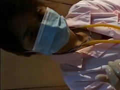 Beautiful Female Surgeon With Surgical Gloves Fisting