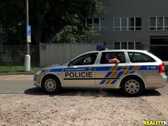 Anxious policeman fucks pretty brunette on the car bonnet