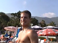 Beautiful amateur couple have fun at the beach