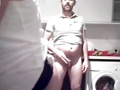 He fucks his wife in the kitchen while the are in the room