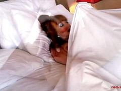 MILF Red gets finger banged under the sheets