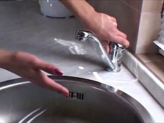 Blonde beauty Mia gets shaved pussy fucked in kitchen